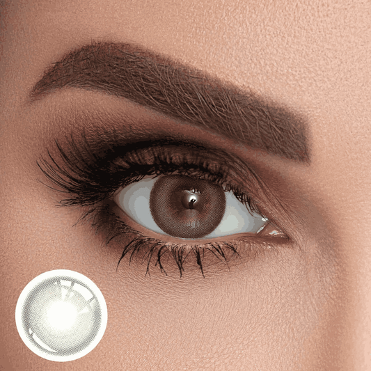 Close-up of a human eye wearing a Forest Green color contact lens, with a subtle green color change, accompanied by an inset image of the contact lens product.