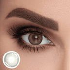 Close-up of a human eye wearing a Forest Green color contact lens, with a subtle green color change, accompanied by an inset image of the contact lens product.